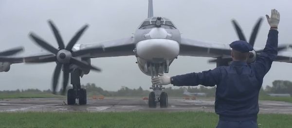 Истребители ВВС Японии перехватили российские Ту-95МС над Японским морем и Тихим океаном - Sputnik Азербайджан