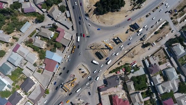 Строительство многоуровневой транспортной развязки на круге Сулутепе Строительство многоуровневой транспортной развязки на круге Сулутепе - Sputnik Азербайджан