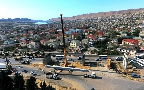 Строительство многоуровневой транспортной развязки на круге Сулутепе Строительство многоуровневой транспортной развязки на круге Сулутепе - Sputnik Азербайджан