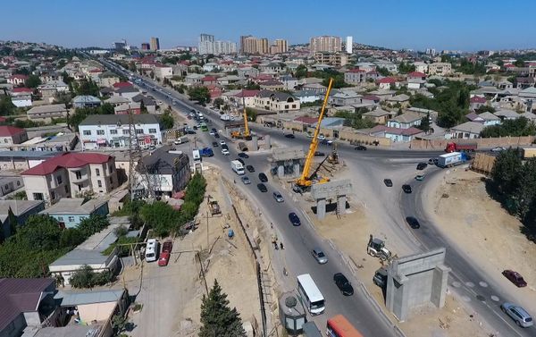Строительство многоуровневой транспортной развязки на круге Сулутепе Строительство многоуровневой транспортной развязки на круге Сулутепе - Sputnik Азербайджан