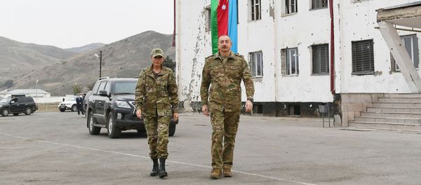lham Əliyev və birinci xanım Mehriban Əliyeva işğaldan azad edilmiş rayonlarında - Sputnik Азербайджан