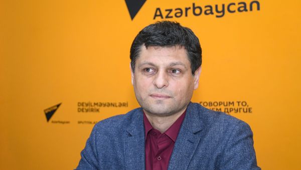 Научный сотрудник Института философии и социологии Национальной Академии Наук Ильхам Аббасов - Sputnik Азербайджан