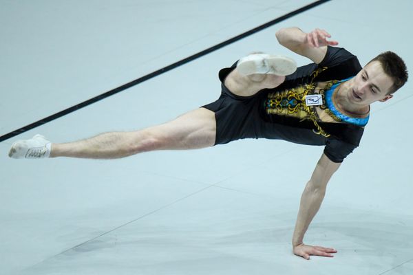 Российский гимнаст Роман Семенов во время выступления на 16-м чемпионате мира по спортивной аэробике в Баку  - Sputnik Азербайджан