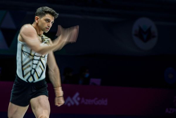 Болгарский гимнаст Антон Папазов во время выступления на 16-м чемпионате мира по спортивной аэробике в Баку  - Sputnik Азербайджан