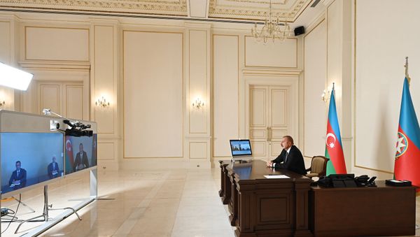 Президент Азербайджана Ильхам Алиев во вторник принял в формате видеосвязи новых глав исполнительной власти Шамкирского и Джалилабадского районов - Sputnik Азербайджан