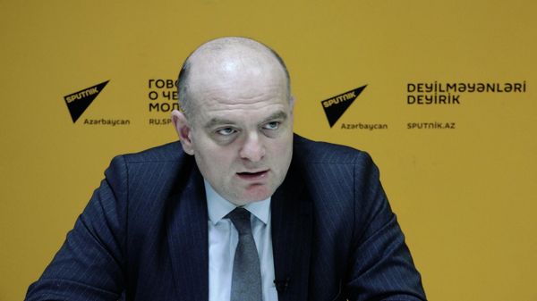 Почему нужно держать курс маната на предсказуемом уровне? - Sputnik Азербайджан