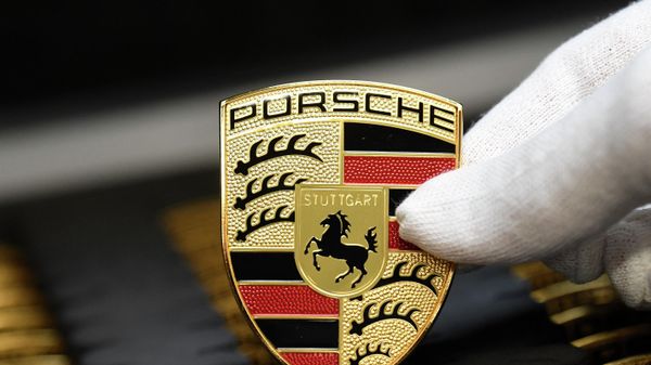 Логотип Porsche, фото из архива - Sputnik Азербайджан