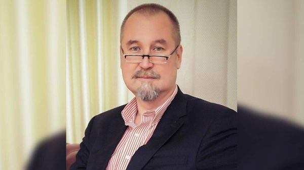Российский эксперт Николай Григорьев - Sputnik Азербайджан