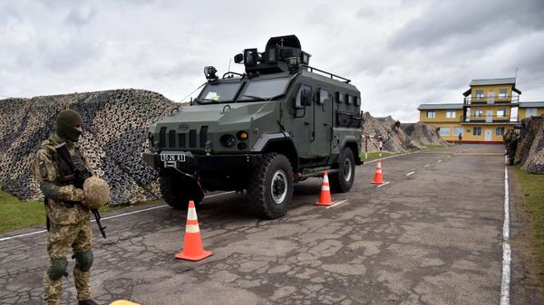 Военнослужащие во время совместных учений Украины и стран НАТО Rapid Trident-2021 на Яворовском полигоне во Львовской области - Sputnik Азербайджан