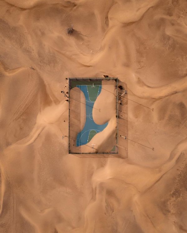 Снимок After Sand Storm российского фотографа Yura Borschev, ставший вторым в категории Urban конкурса Drone Photo Awards 2022. - Sputnik Азербайджан