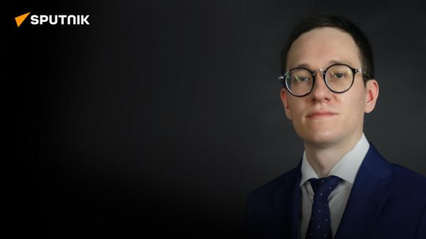 Американист Дудаков: кризис в США заставит американцев снизить активность на мировой арене - Sputnik Азербайджан