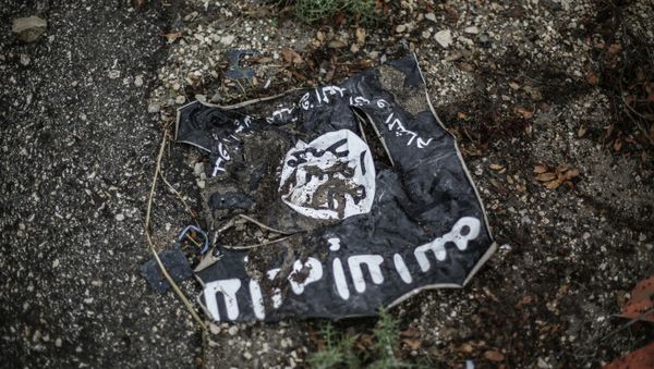 The flag of the radical Islamist organization Islamic State of Iraq - Sputnik Азербайджан