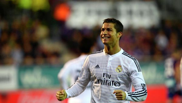 Real Madrid's Cristiano Ronaldo celebrates a goal during their Spanish first division soccer match against Eibar at Ipurua stadium in Eibar November 22, 2014. - Sputnik Азербайджан