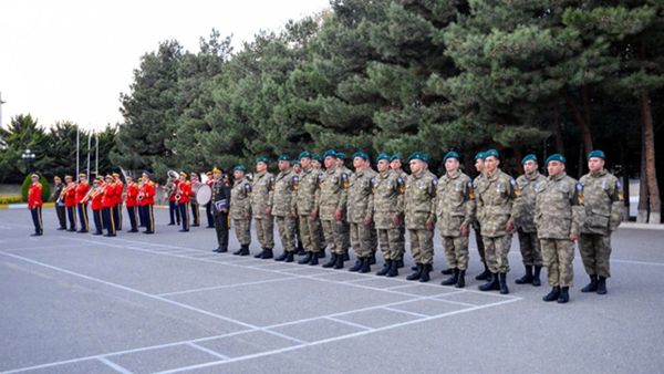Группа азербайджанских миротворцев вернулась в Азербайджан из Афганистана - Sputnik Азербайджан