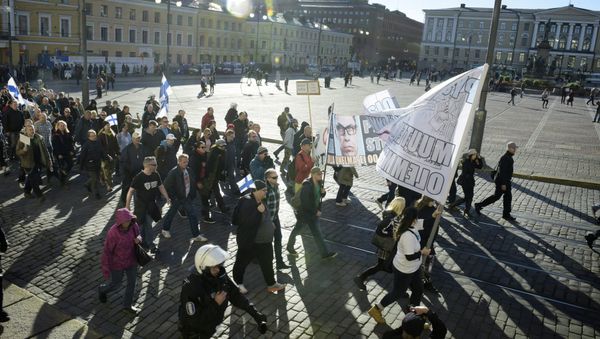 Жители Хельсинки протестуют против мигрантов. Архивное фото - Sputnik Азербайджан
