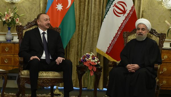 Встреча Президента Азербайджанской Республики Ильхама Алиева и Президента Исламской Республики Иран Хасана Роухани. Архивное фото - Sputnik Азербайджан