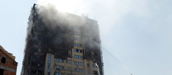 Пожар в жилом здании в Бинагадинском районе Баку - Sputnik Азербайджан