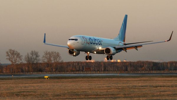 Самолет авиакомпании Flydubai. Архивное фото Самолет авиакомпании Flydubai. Архивное фото - Sputnik Азербайджан