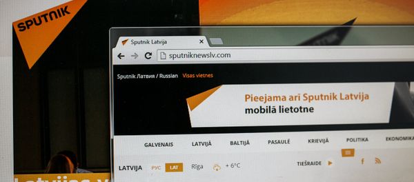 Монитор компьютера с сайтом Sputnik Латвия Монитор компьютера с сайтом Sputnik Латвия - Sputnik Азербайджан