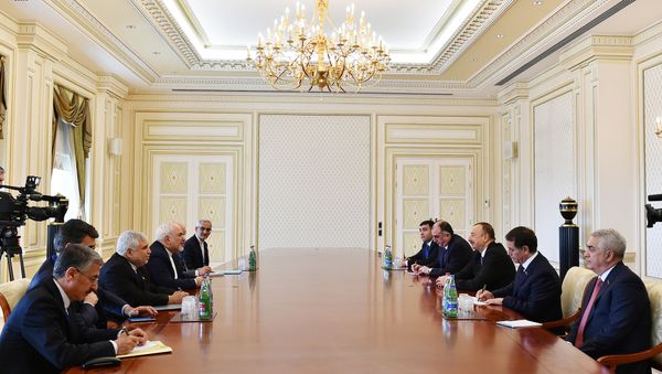 Президент АР Ильхам Алиев и министр иностранных дел ИРИ Мохаммад Джавад Зариф - Sputnik Азербайджан