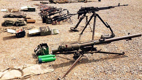 Захваченные вооружения и боеприпасы армянских вооруженных формирований - Sputnik Азербайджан