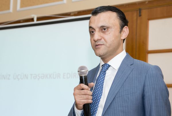 Вюгар Гурбанов, глава отдела обязательного медицинского страхования Госагентства  - Sputnik Азербайджан