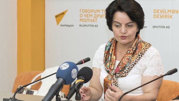 Геренфиль Дюньямингызы, преподаватель Бакинского Государственного Университета - Sputnik Азербайджан