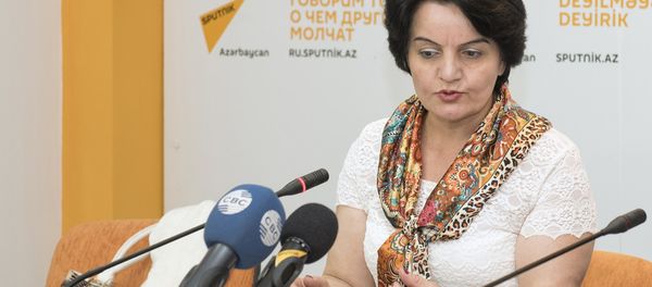 Геренфиль Дюньямингызы, преподаватель Бакинского Государственного Университета - Sputnik Азербайджан