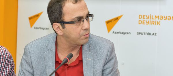 Генеральный директор Центра исследования наследия Гейдара Алиева Фуад Бабаев - Sputnik Азербайджан