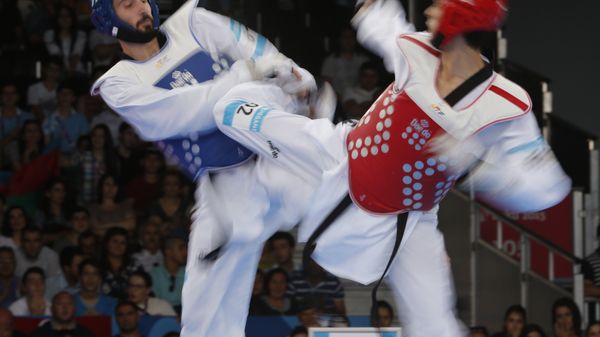 Bakı-2015 Avropa Oyunları çərçivəsində taekvondo yarışlarının yarımfinalında Culio Ferrera (Portuqaliya) və Milad Beyqi Harçeqaninin (Azərbaycan) döyüşü. Bakı, 18 iyun 2015-ci il - Sputnik Азербайджан
