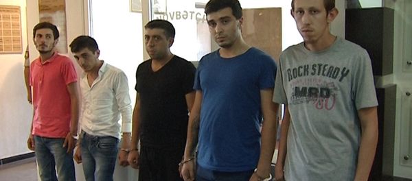 Члены преступной группировки, обвиняемые в убийстве Эльнура Гумбатова - Sputnik Азербайджан