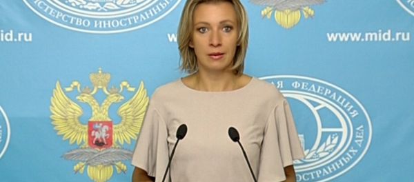 Захарова о белорусском паралимпийце, пронесшем флаг РФ - Sputnik Азербайджан