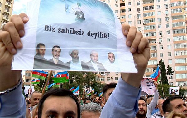 Участник митинга, организованного Национальным советом Участник митинга, организованного Национальным советом - Sputnik Азербайджан
