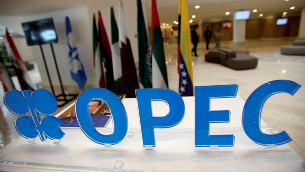 Эмблема лого на неформальной встрече стран-членов ОПЕК  в Алжире - Sputnik Азербайджан