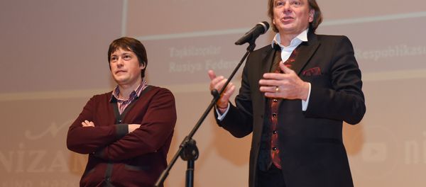 Дни кино открывали российский режиссер Юрий Васильев и директор продюсерского центра Кинофест Сергей Брагин. - Sputnik Азербайджан