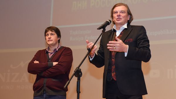 Дни кино открывали российский режиссер Юрий Васильев и директор продюсерского центра Кинофест Сергей Брагин. - Sputnik Азербайджан