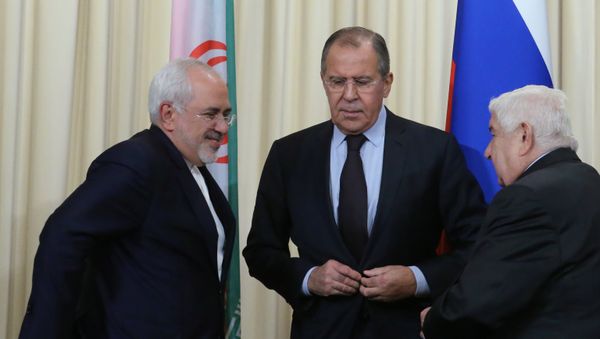 Встреча глав МИД России, Ирана и Сирии С. Лаврова, М. Зарифа и В. Муаллема - Sputnik Азербайджан