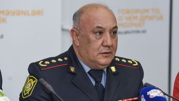 Заведующий отделом по связям с общественностью Управления государственной дорожной полиции Главного управления полиции Баку полковник полиции Вагиф Асадов - Sputnik Азербайджан