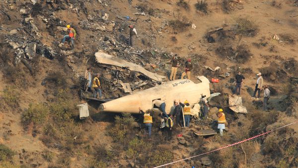Крушение самолета авиакомпании Pakistan International Airlines - Sputnik Азербайджан