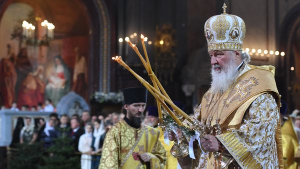 Патриарх Московский и всея Руси Кирилл на Рождественском богослужении в храме Христа Спасителя в Москве - Sputnik Азербайджан