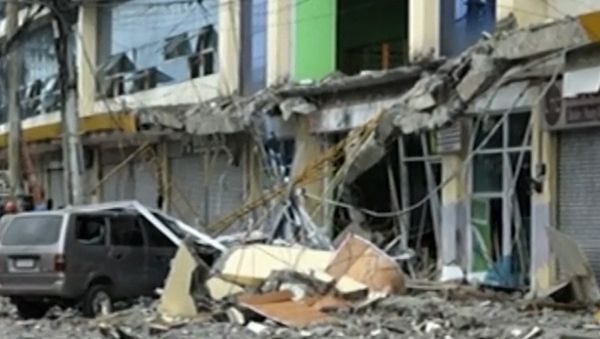 Последствия землетресения в Филиппинах - Sputnik Азербайджан