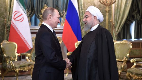 Президент РФ Владимир Путин и президент Исламской Республики Иран Хасан Рухани во время встречи, 28 марта 2017 - Sputnik Азербайджан