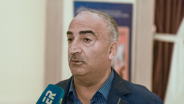 Заслуженный деятель искусств Азербайджана Натиг Расулзаде - Sputnik Азербайджан