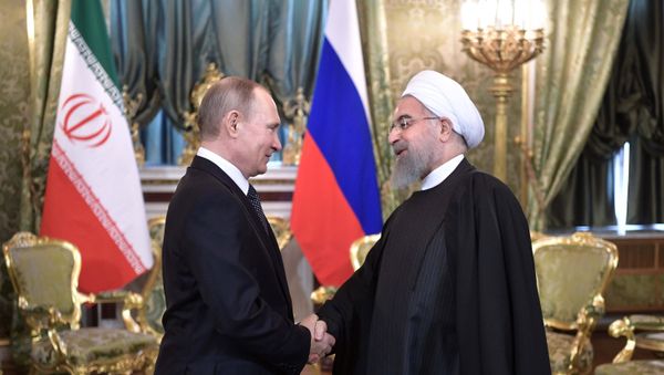 Президент РФ Владимир Путин и президент Исламской Республики Иран Хасан Рухани во время встречи, 28 марта 2017 года - Sputnik Азербайджан