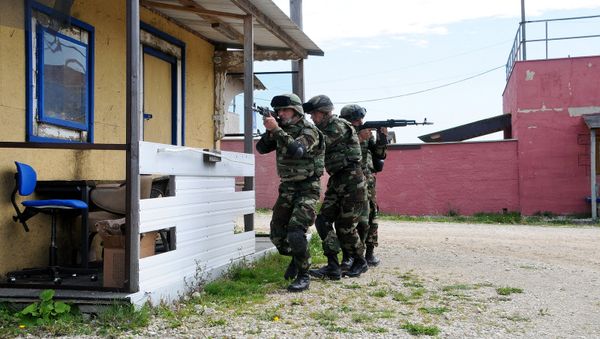 Азербайджанские военнослужащие в центре военной подготовки НАТО в Хоэнфельсе, Германия, 14 сентября 2012 года - Sputnik Азербайджан
