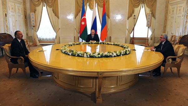 Президент России Владимир Путин, президент Азербайджана Ильхам Алиев и президент Армении Серж Саргсян во время встречи в Санкт-Петербурге, 20 июня 2016 года - Sputnik Азербайджан