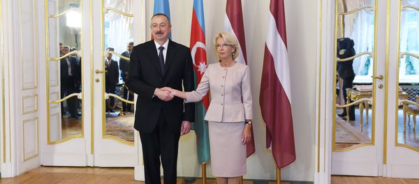 Президент Азербайджана Ильхам Алиев и председатель Сейма Латвии Инара Мурниеце - Sputnik Азербайджан