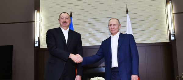 Президент РФ Владимир Путин и президент Азербайджана Ильхам Алиев во время встречи, 21 июля 2017 года - Sputnik Азербайджан