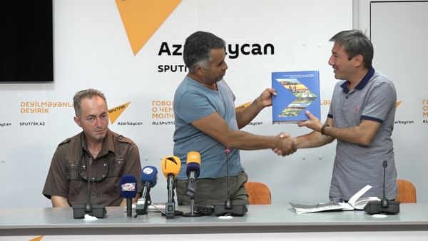 Объединение фотографов Азербайджана преподнесло подарок Sputnik - Sputnik Азербайджан