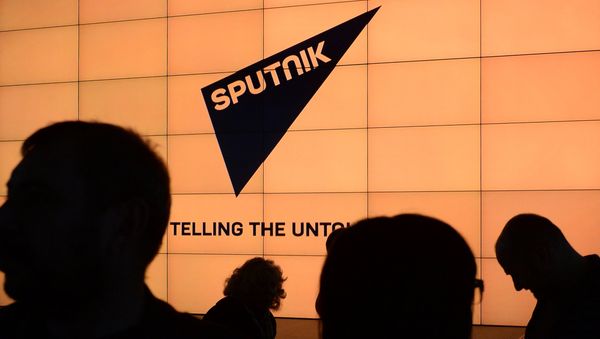 Логотип международного информационного бренда Спутник, фото из архива - Sputnik Азербайджан